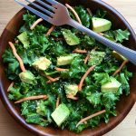 This Kale, Carrot, and Avocado Salad is light, tasty, and delicious! It is made with simple, whole food ingredients and comes together so easily. Always a crowd-pleaser! Vegan, gluten-free, paleo, and Whole 30 approved.